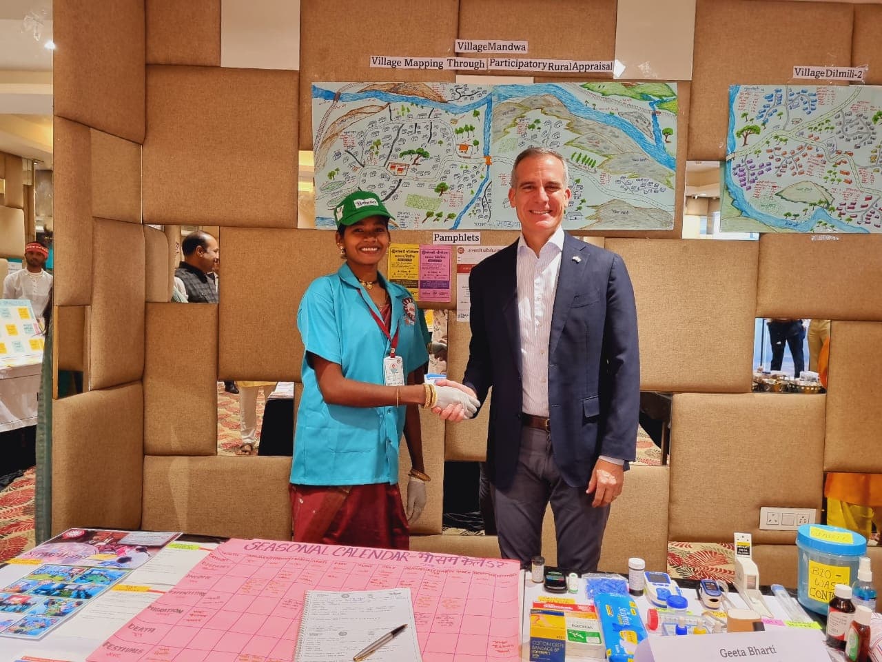 Community health entrepreneur showcasing village mapping